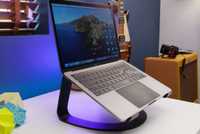 A MacBook Pro on a laptop stand. 