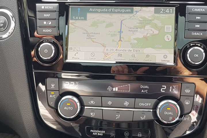 A closeup on a Nissan's infotainment system. 