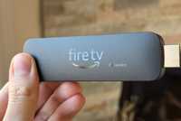 Person holding Fire TV Stick 4K Max.
