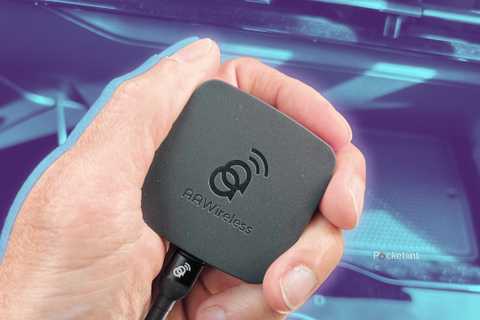 AA Wireless Dongle for Android Auto in hand