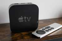 The Apple TV 4K sitting on a shelf 