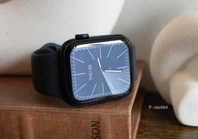 The Apple Watch SE 3 sitting on a book