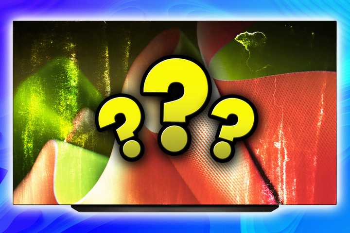 Tv screen with distorted image and question marks on the image