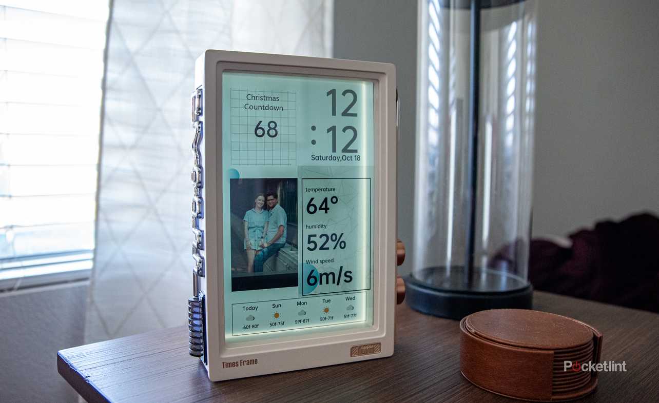 A still photo of the Divoom Times Frame on an end table.