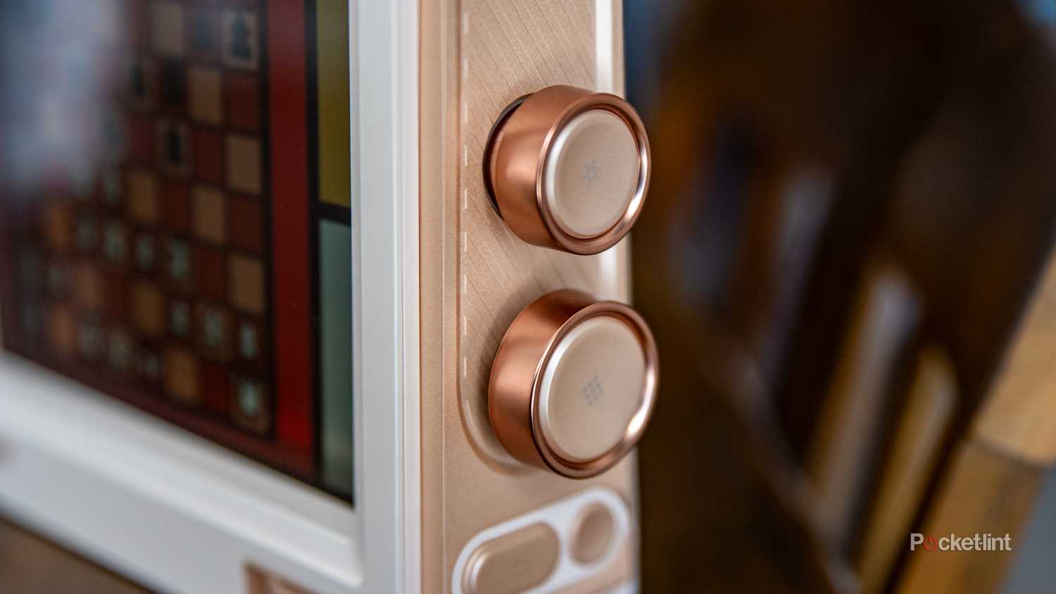 A still photo of the Divoom Times Frame dial controls.