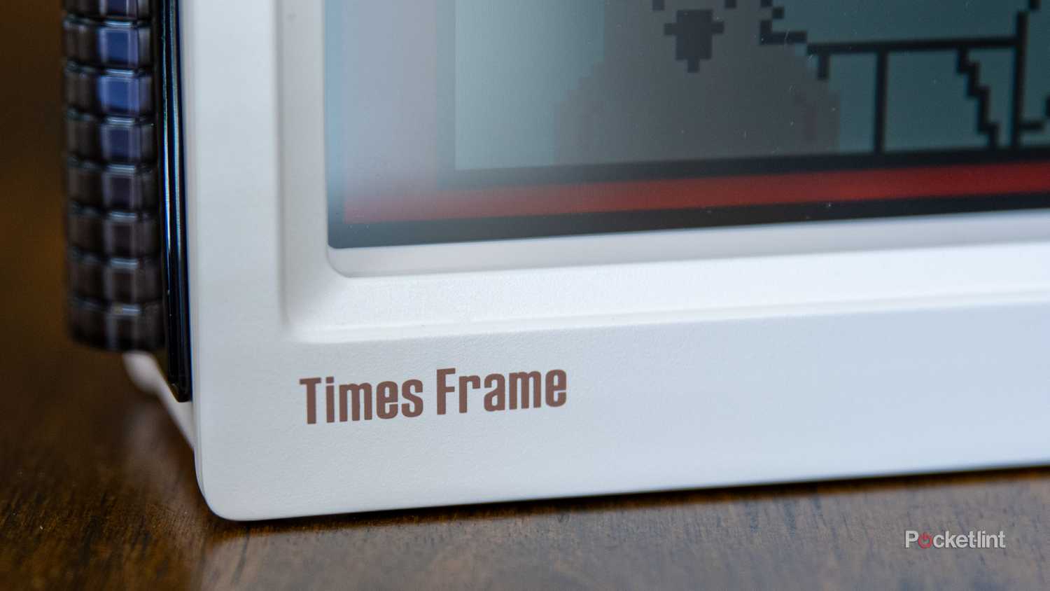 A still photo of the Divoom Times Frame logo on the frame itself. 