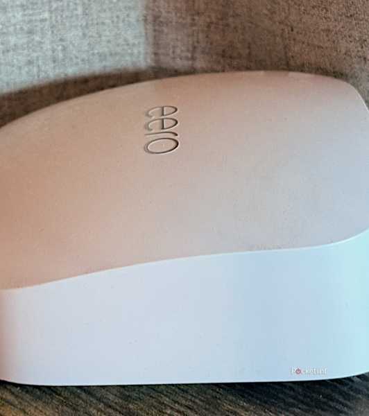 An Eero Pro 6E Wi-Fi router on a desk.