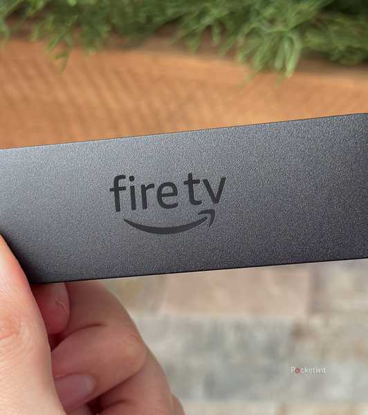 Person holding Fire TV Stick 4K Max.