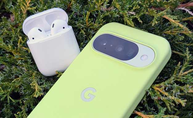 A Google Pixel 10 next to Apple AirPods second generation.