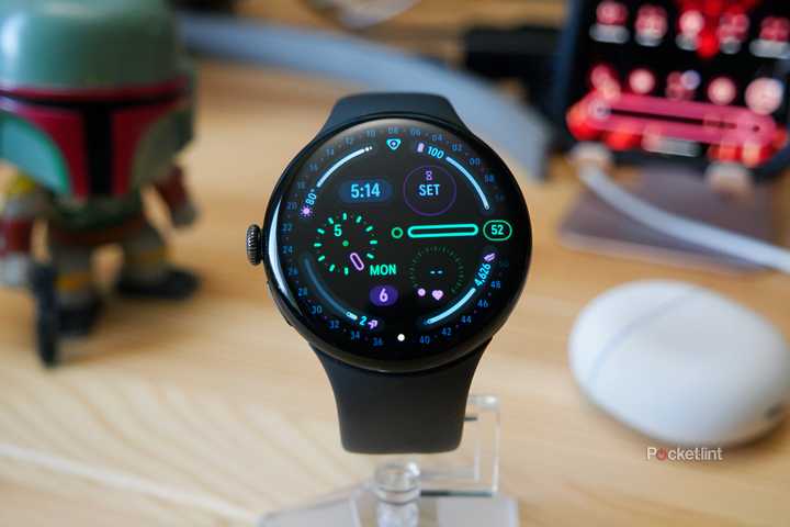 Google's Pixel Watch 4 sitting on a stand