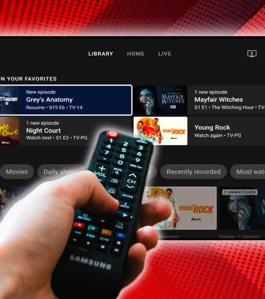 A person with a remote pointing it at YouTube TV. 
