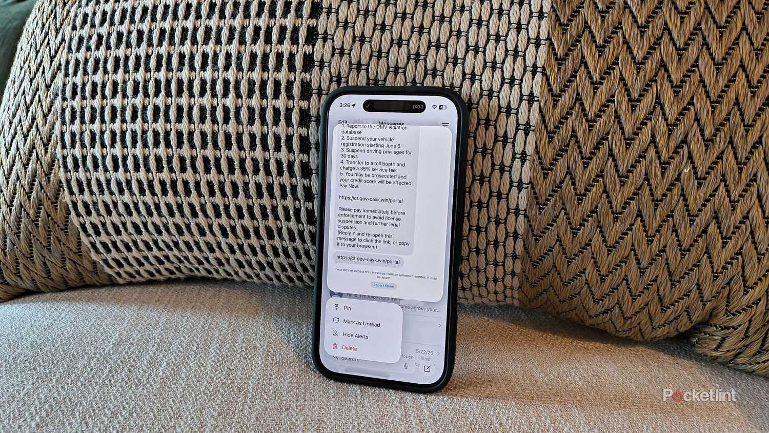 Opening a preview of a phishing text. 