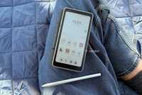 A Palma 2 Pro and InkSense Plus stylus laying on a leg.