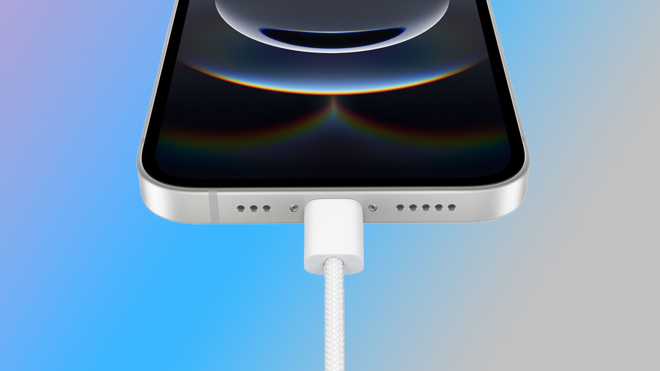 An iPhone 16e charging against a blue background