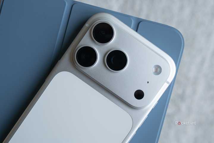 An iPhone 17 Pro sitting on top of an iPad.