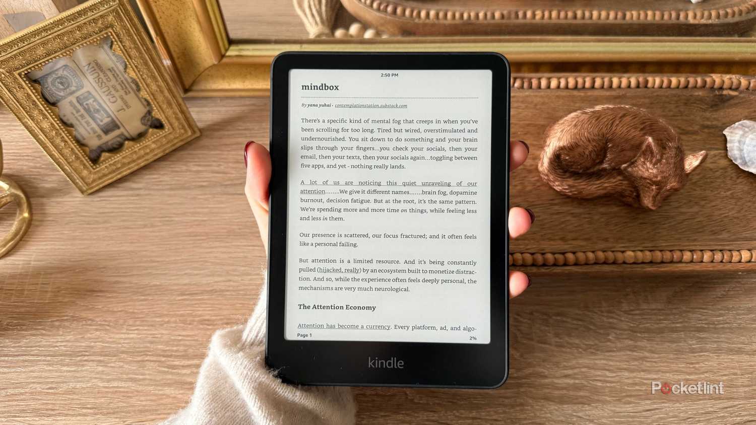 A Kindle Paperwhite with a substack.