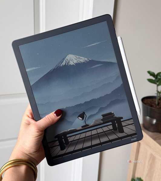 The Kindle Scribe Colorsoft with a mountain. 