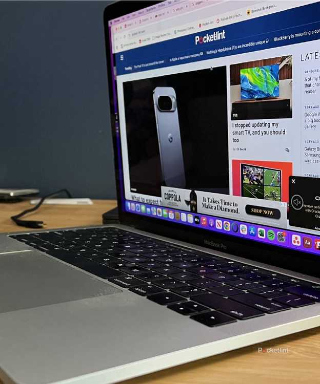 An open MacBook Pro with its side ports showing.