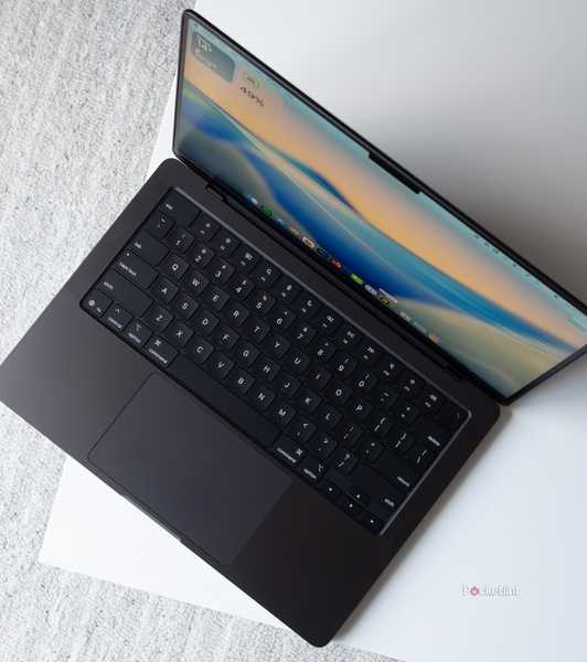 The M5 MacBook Pro from a top down perspective on a table 