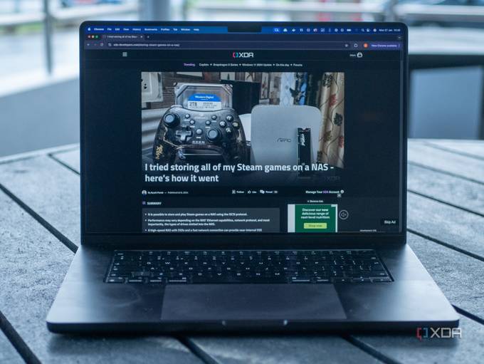 16-inch MacBook Pro showing the XDA home page