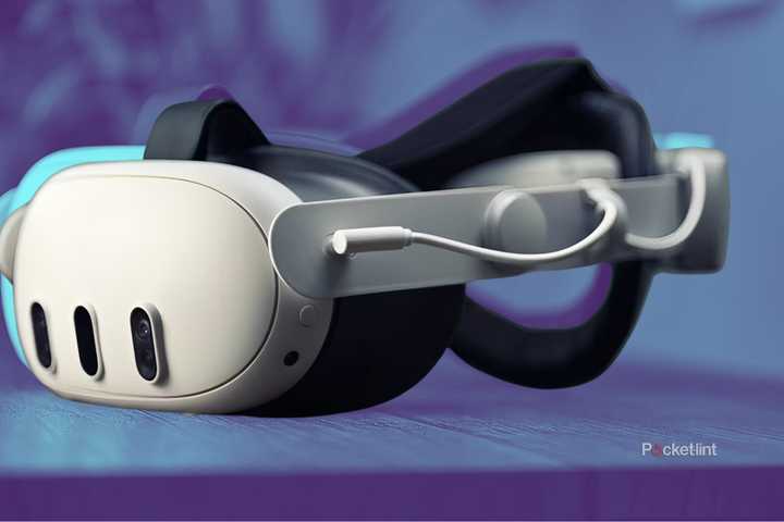Meta Quest 3 headset on a table on a colored background
