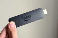 Person holding Amazon Fire TV Stick 4K Max.
