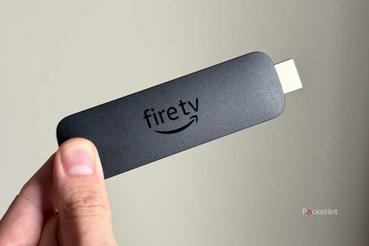 Person holding Amazon Fire TV Stick 4K Max.
