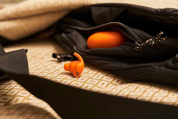 Orange Powerbeats Fit. 