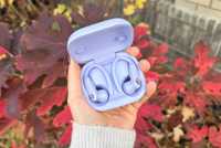 Purple Powerbeats Pro 2 headphones in case. 