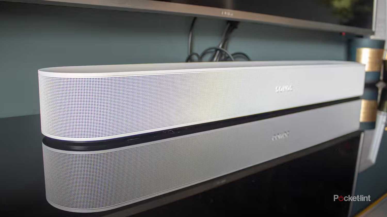 A Sonos Beam on a stand. 