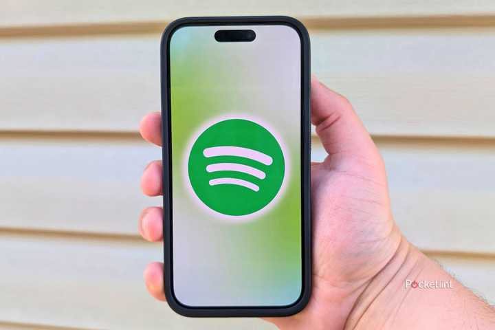 The Spotify logo on a smartphone 