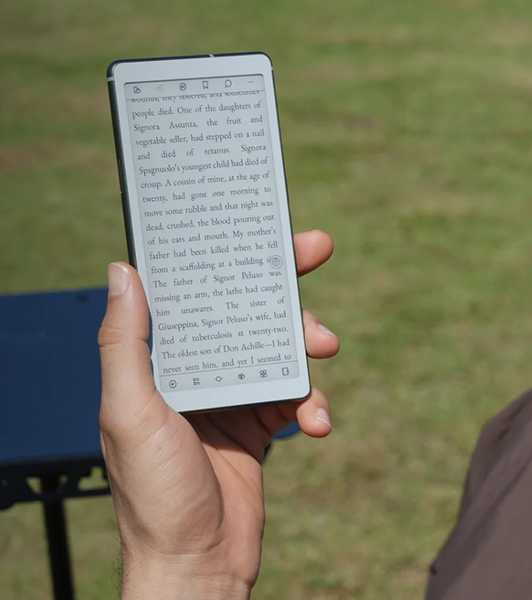 Person using Viwoods AiPaper Reader.