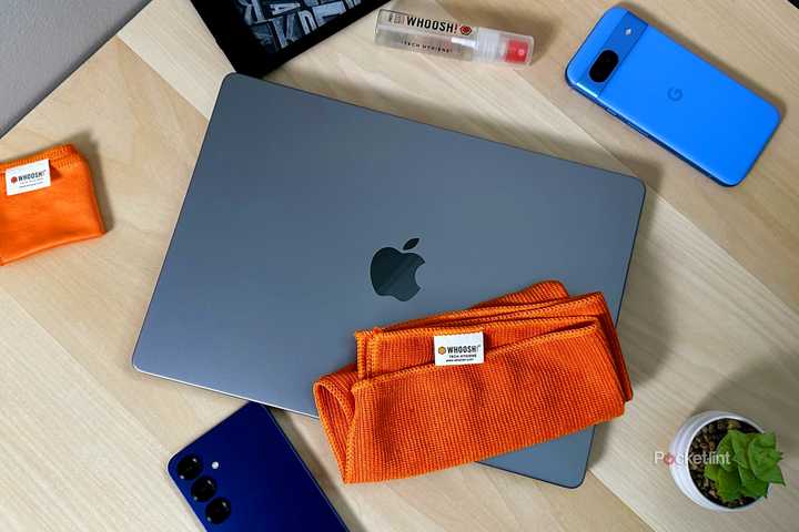 Whoosh cleaning cloth with MacBook and phones.